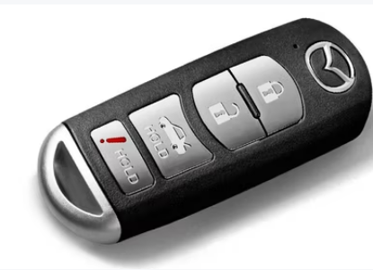 Кнопка Hold на ключе Mazda